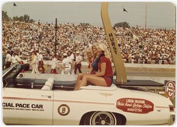 (INDY 500) Album containing 156 photographs of the famed Indiana 500 races, including pre-race parades, practice laps, motorcars zoomin